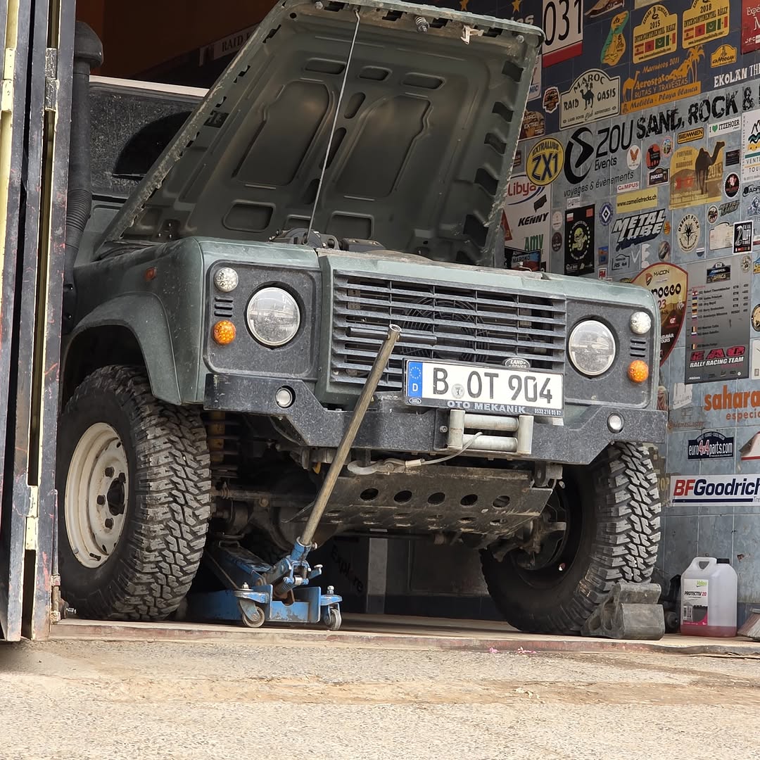 German Land Rover Defender B-OT 904 on jacks at Garage Iriki Zagora during professional oil leak seal replacement