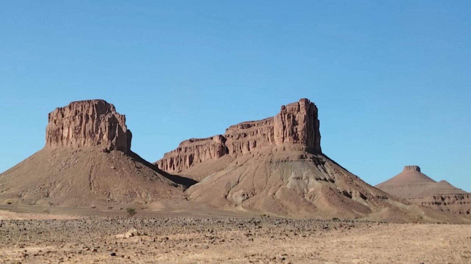 Mesa formations and open rocky terrain south of Zagora