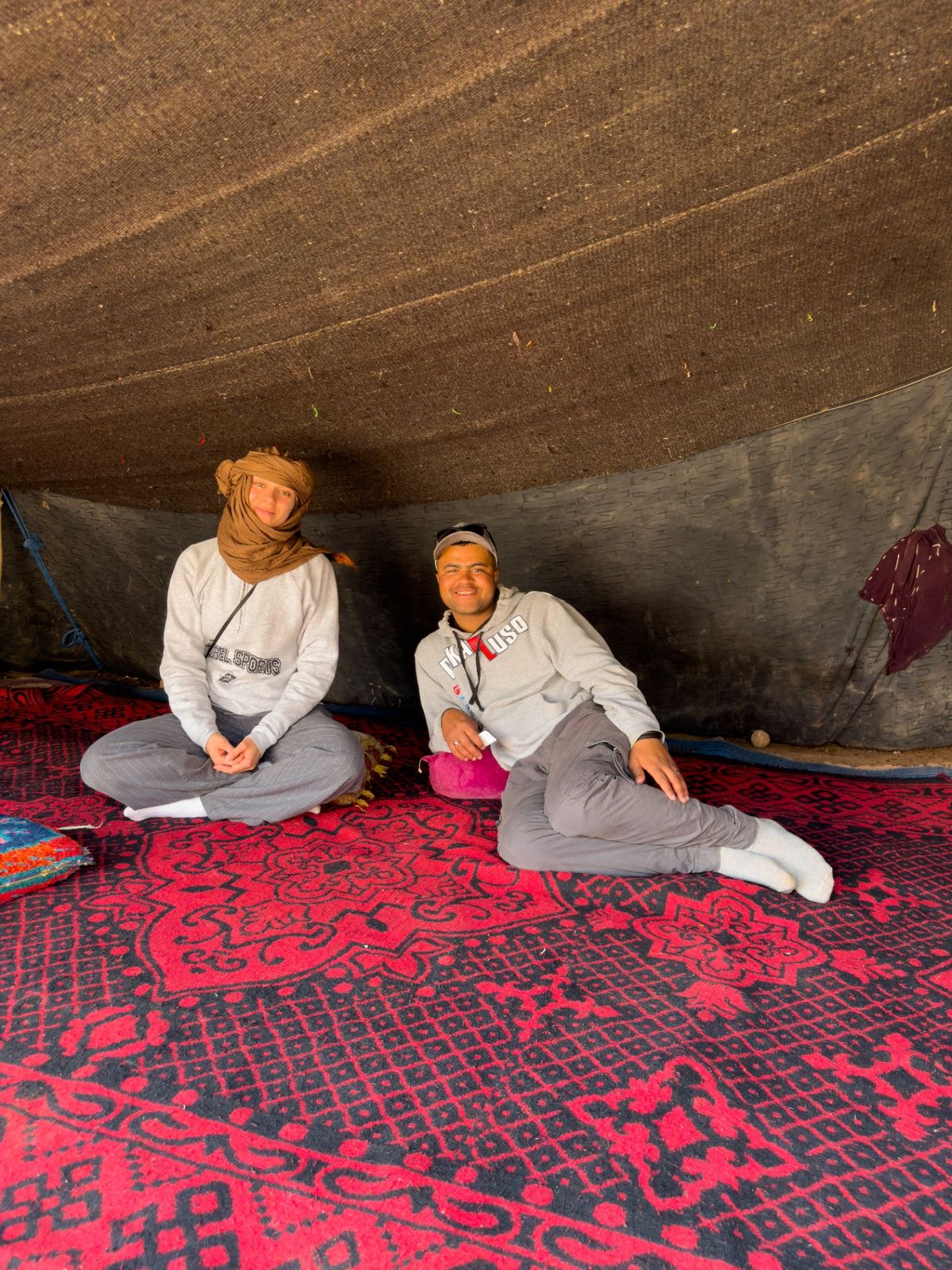 Zakaria and a guest inside a nomad tent