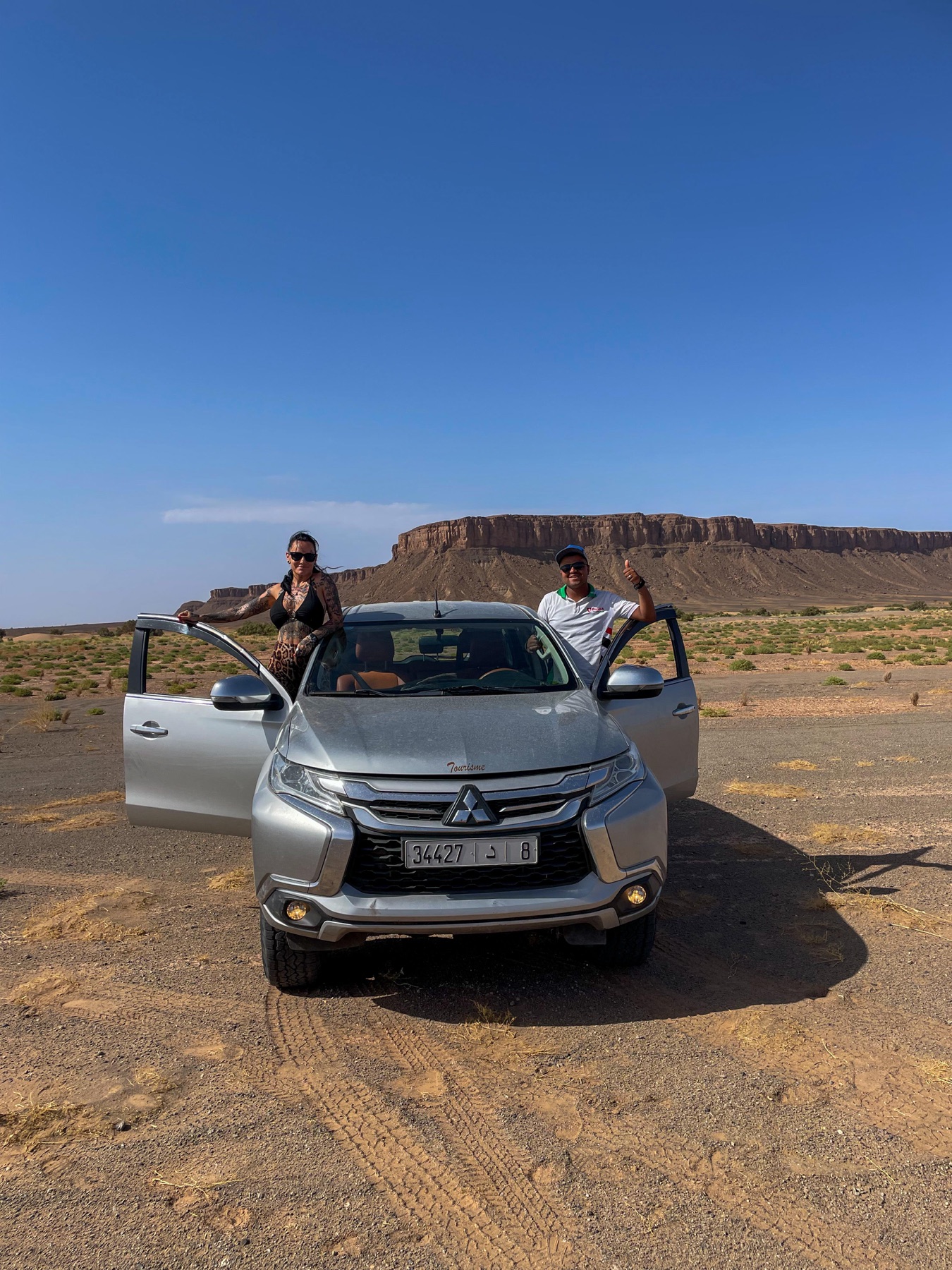 Mitsubishi expedition vehicle on a sandy desert route