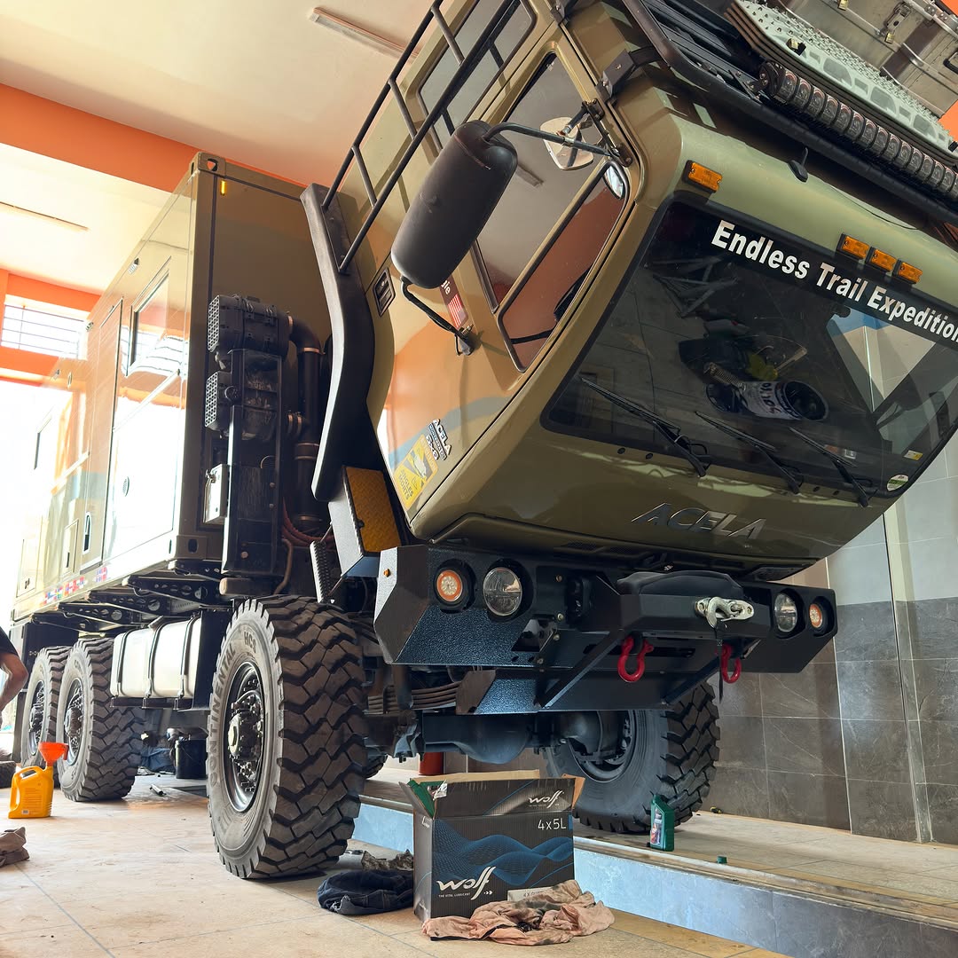 Underside view of the tilted Acela cab during oil and mechanical service with Wolf lubricants at Zicaaaas